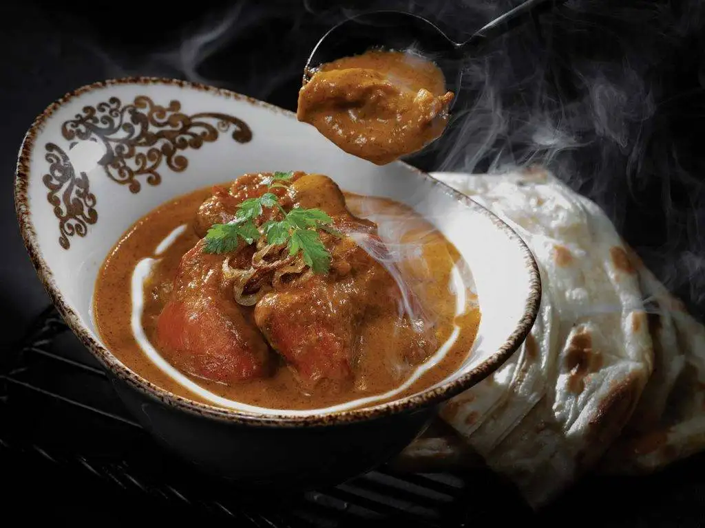 Home 12 P13. CURRIES SECTION CHICKEN Butter Chicken 2